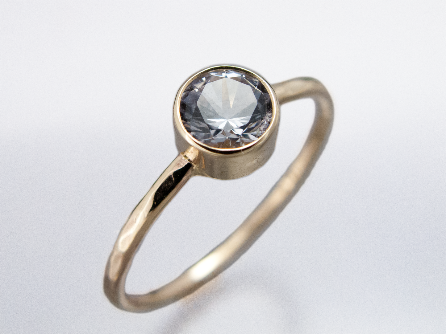 White Sapphire Engagement Ring, Round Straight Sided Bezel and a Delicate 1.3mm Round Band | 3-6mm Sapphire in 14k Gold