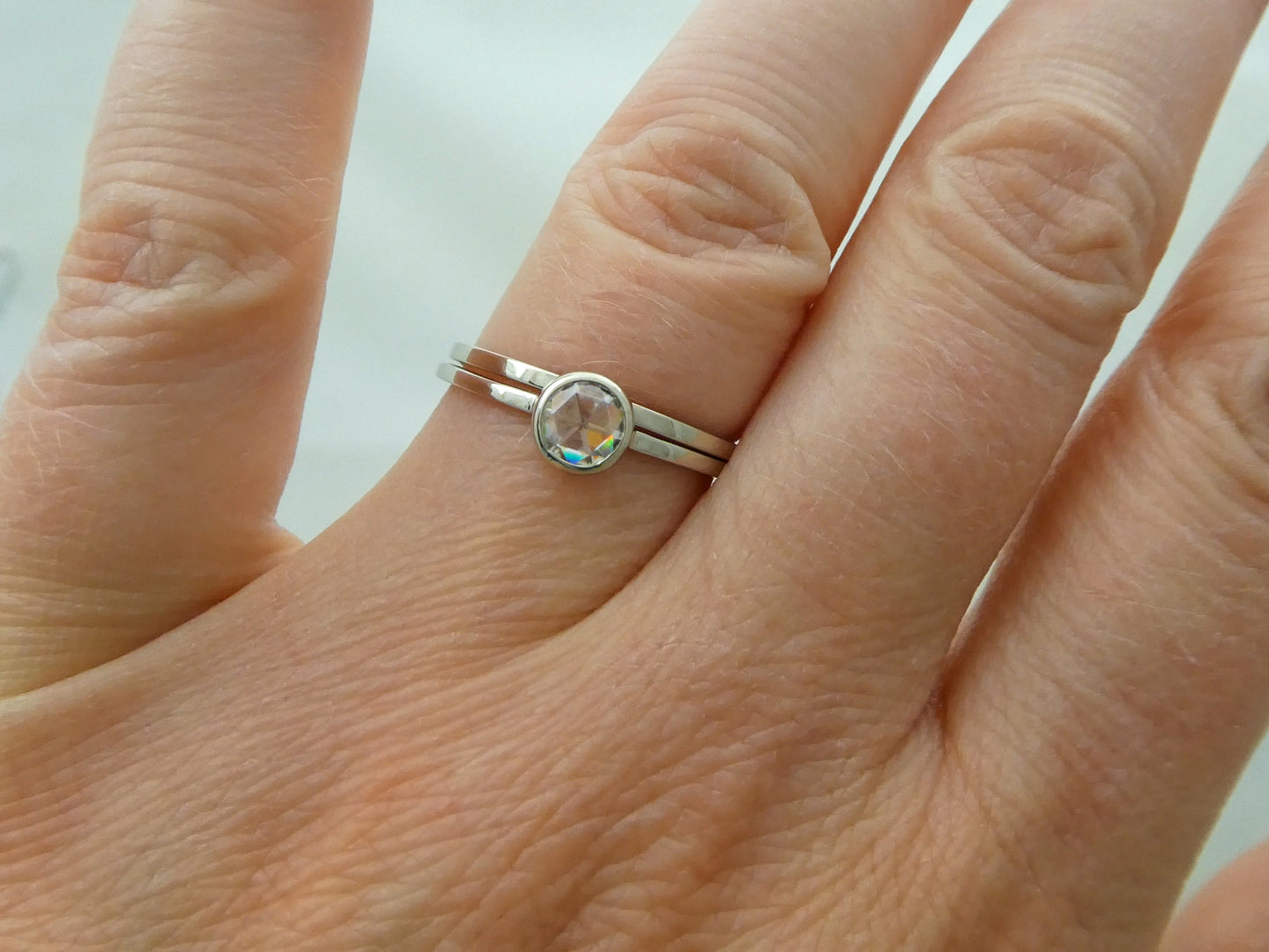 Rose Cut Moissanite Engagement Ring in 14k Gold with a low round bezel and slim square band