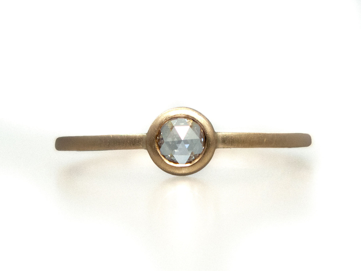 Rose Cut Moissanite Engagement Ring in 14k Gold with a low round bezel and slim square band