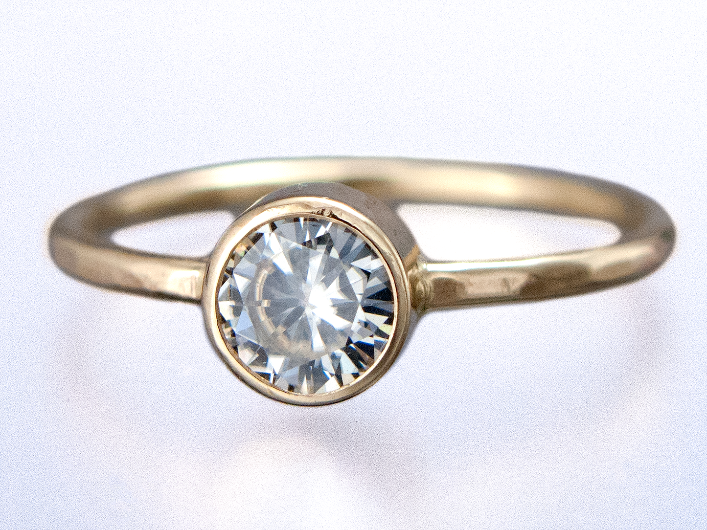 White Sapphire Engagement Ring, Round Straight Sided Bezel and a Delicate 1.3mm Round Band | 3-6mm Sapphire in 14k Gold