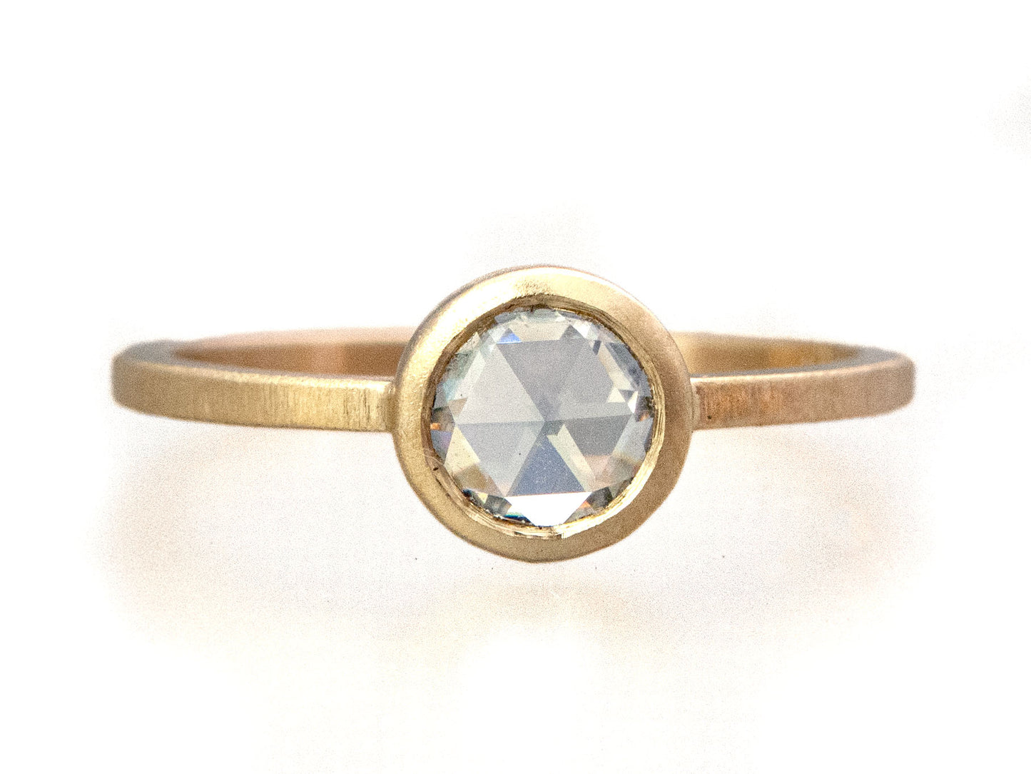 Rose Cut Moissanite Engagement Ring in 14k Gold with a low round bezel and slim square band