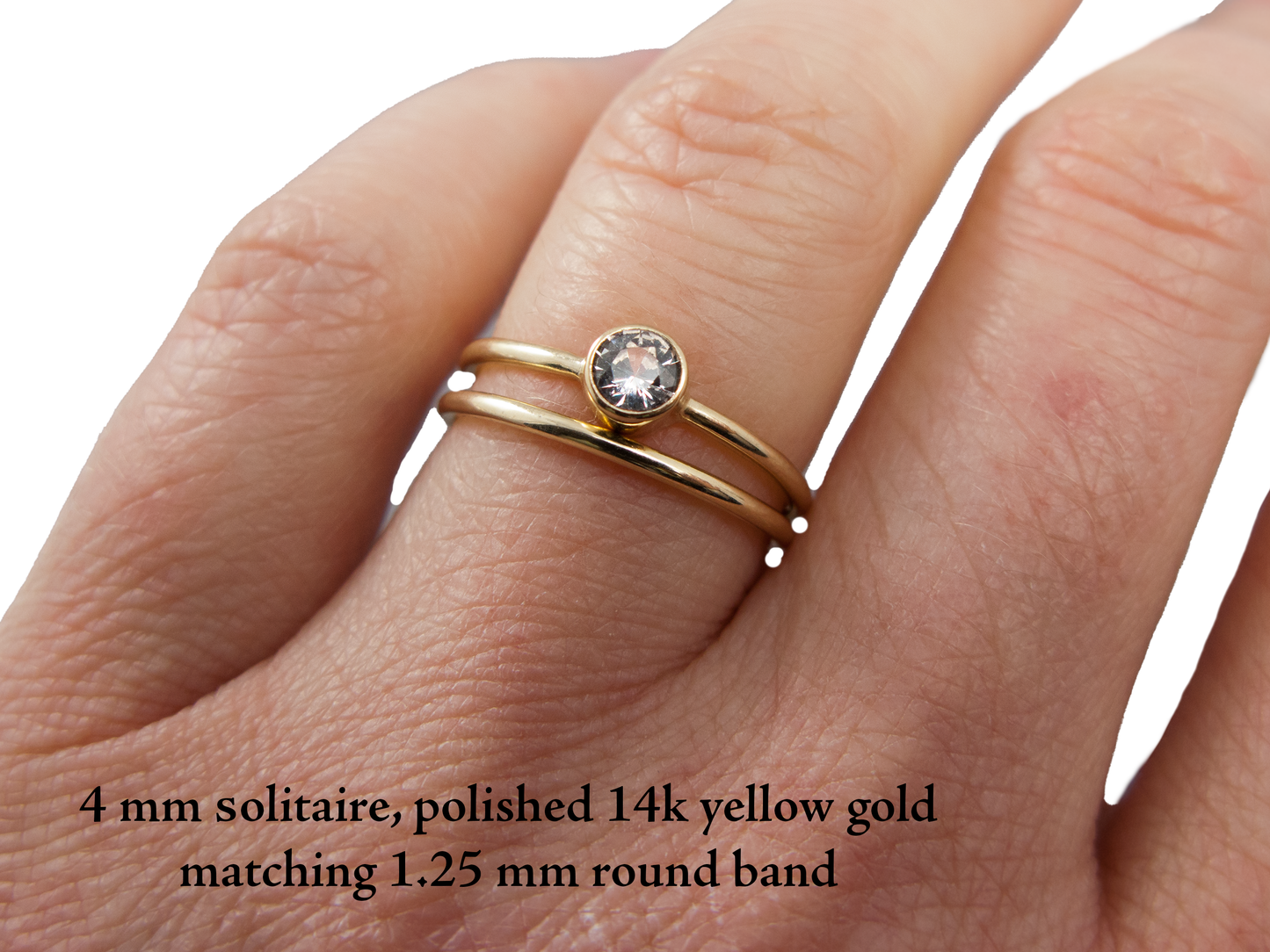 Moissanite Engagement Ring with a Delicate 1.3mm Round and 3mm-6mm Solitaire Straight Bezel in 14k Gold