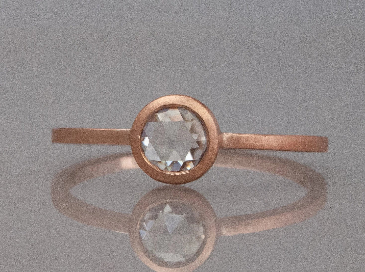 Rose Cut Moissanite Engagement Ring in 14k Gold with a low round bezel and slim square band