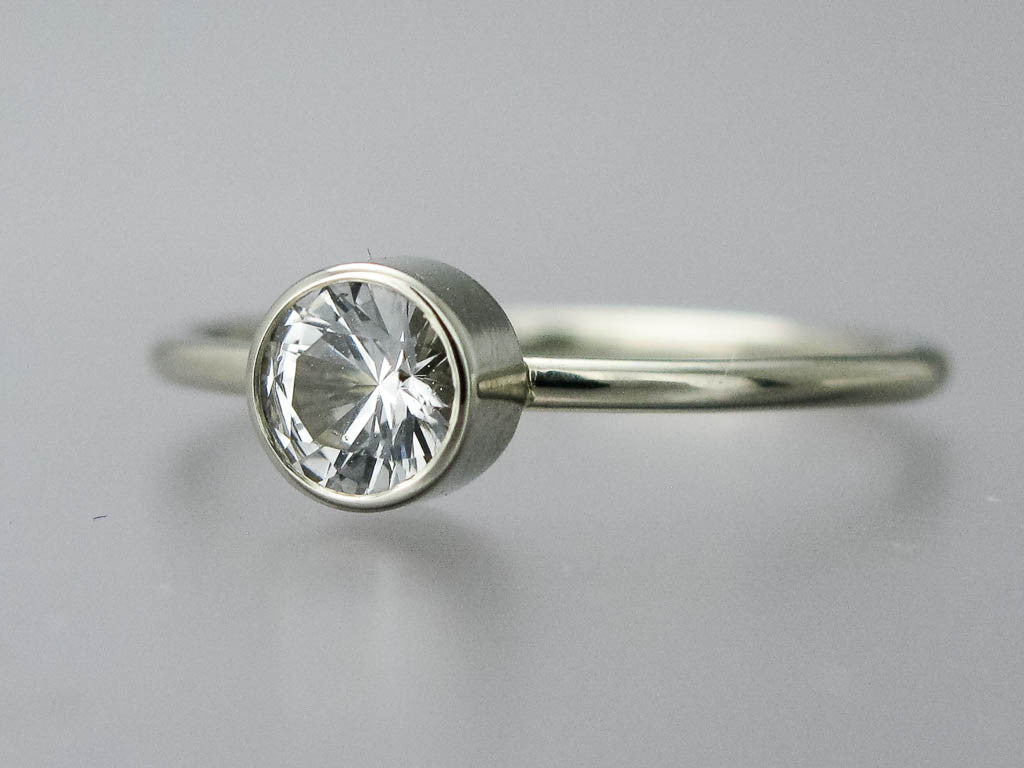White Sapphire Engagement Ring with 3mm to 6mm Solitaire with Stacked Bezel and a Delicate 1.3mm Round Band Custom Made in 14k Gold