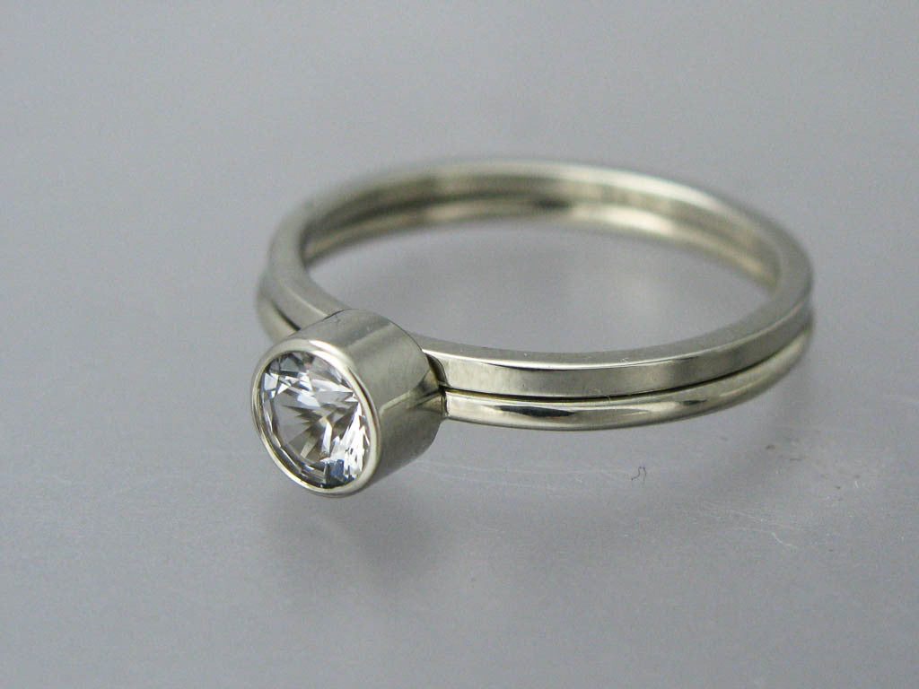 White Sapphire Engagement Ring with 3mm to 6mm Solitaire with Stacked Bezel and a Delicate 1.3mm Round Band Custom Made in 14k Gold